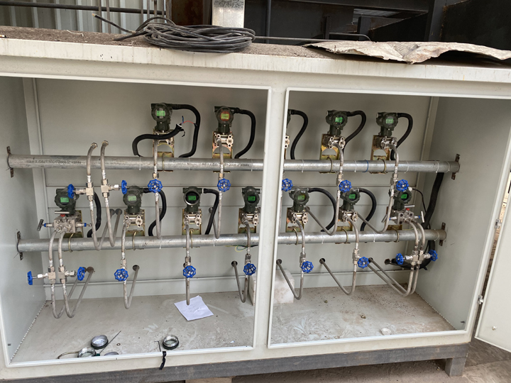 Where do pressure transmitters work in a power plant?